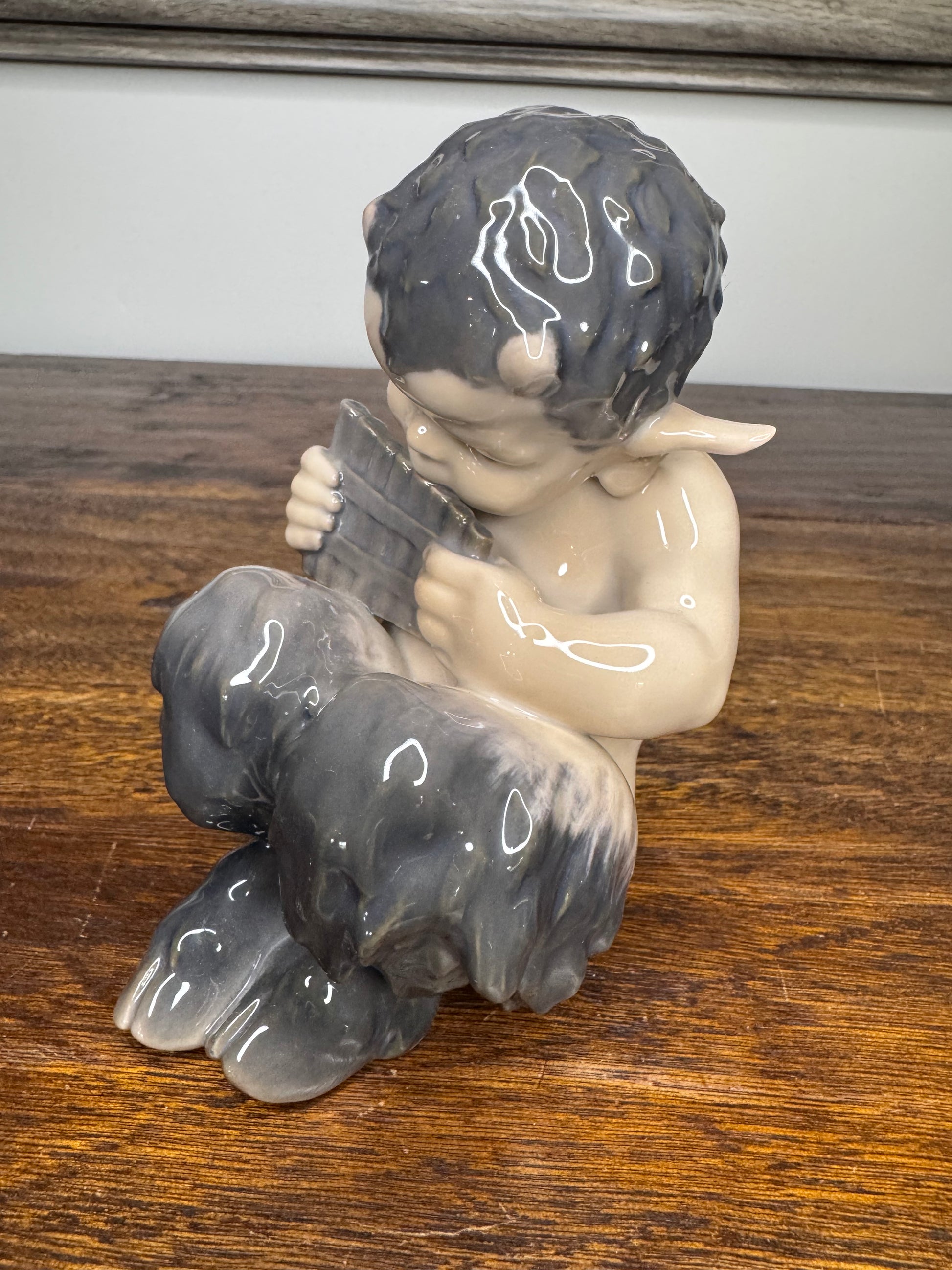 Antique Royal Copenhagen Faun Playing a Pan Flute Figurine