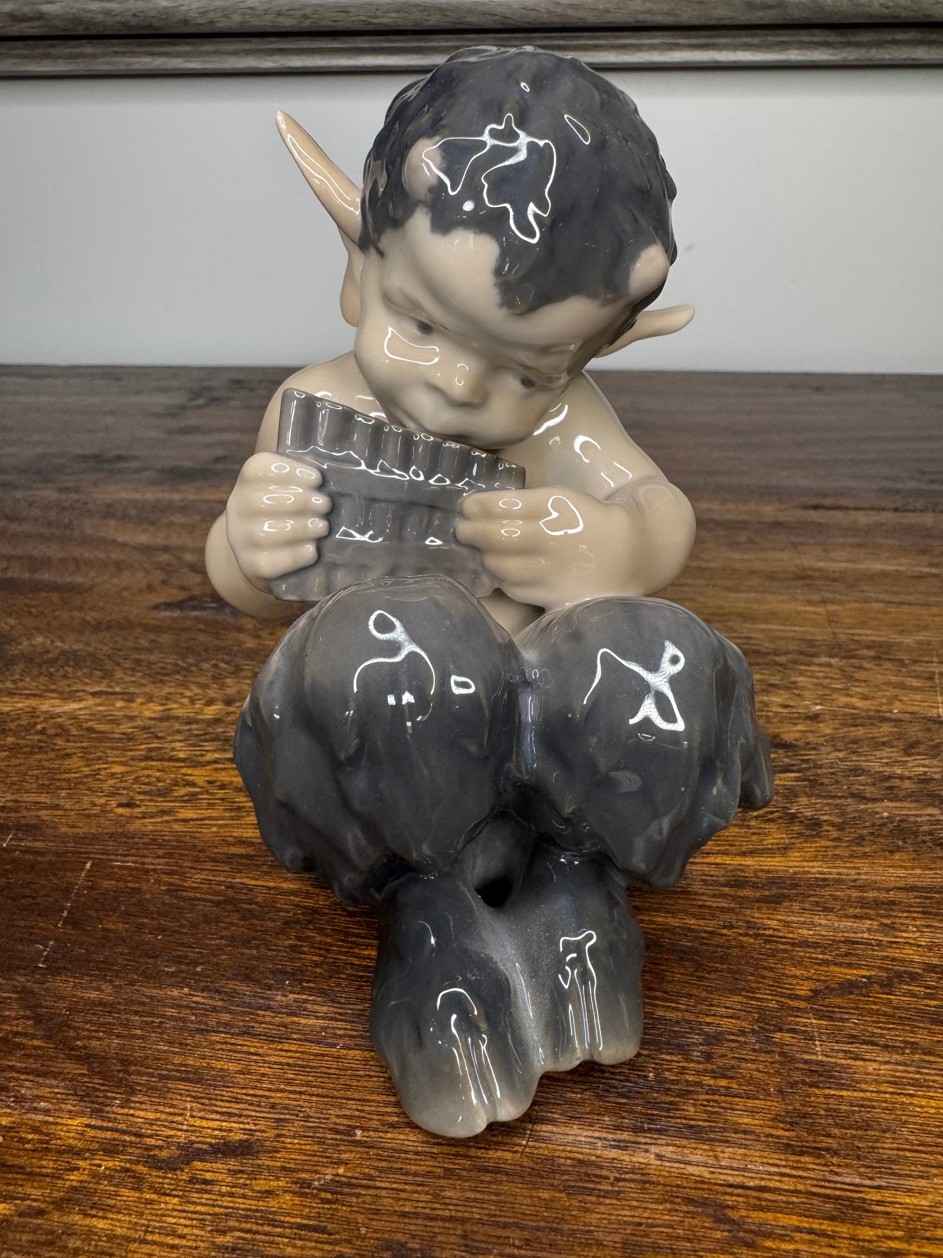 Antique Royal Copenhagen Faun Playing a Pan Flute Figurine