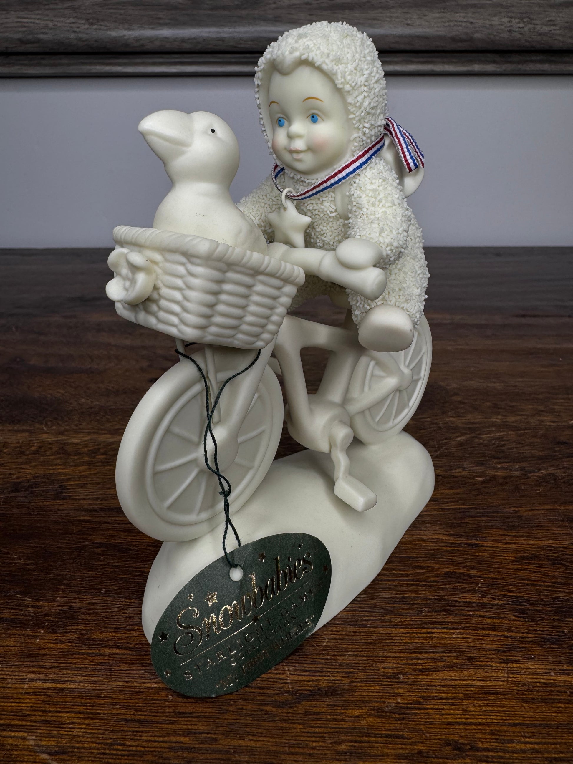 Retired Dept 56 Snowbabies "My First Wheels" Figurine