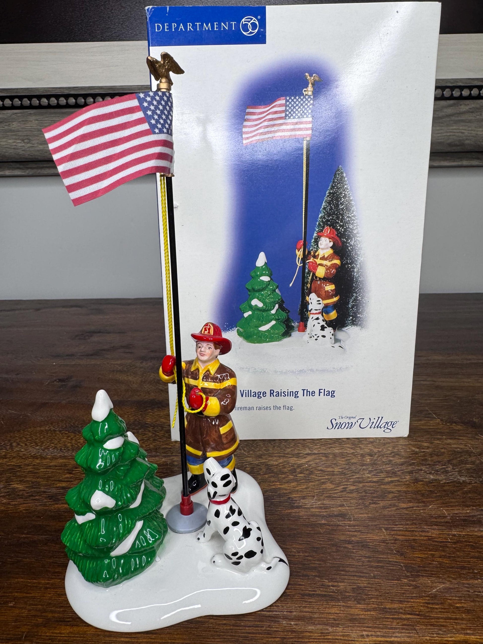 Retired Dept 56 Snow Village Raising the Flag Firefighter Figurine w/ Original Box